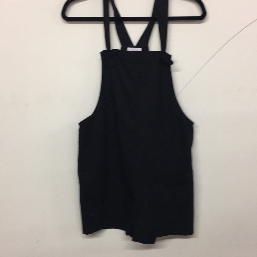 Pink Lily small black romper. Like new